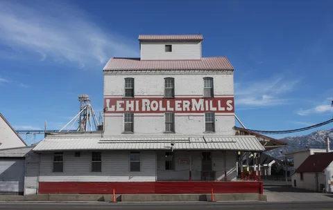 The historic Lehi Roller Mills on Main Street in Lehi under a blue sky