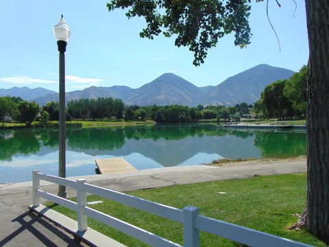Salem Pond reflecting the mountains on a clear summer morning