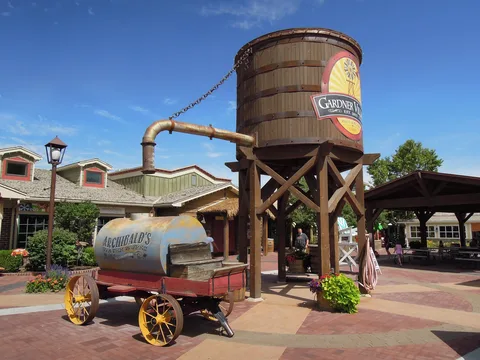 The old wooden water tower and wagon at Gardner Village in West Jordan