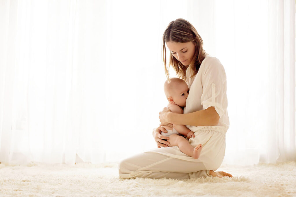 Mom breastfeeding her new baby