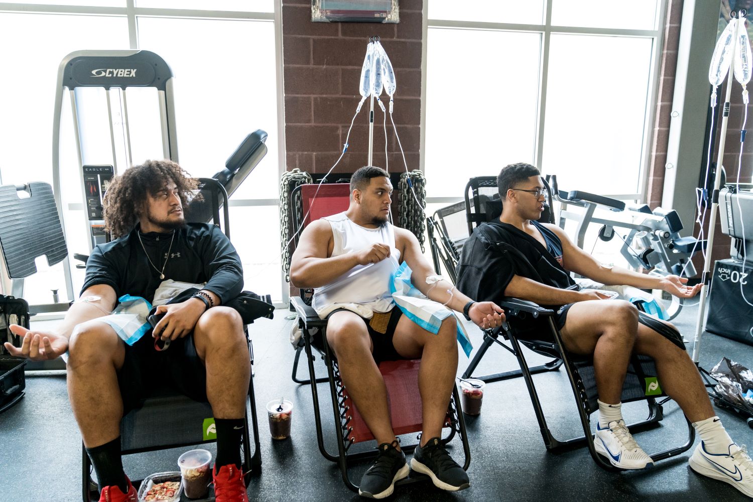Three athletes getting Sports IV Therapy