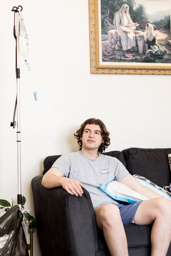 IV Therapy Patient and Saline Bag getting Mobile IV Therapy Saratoga Springs