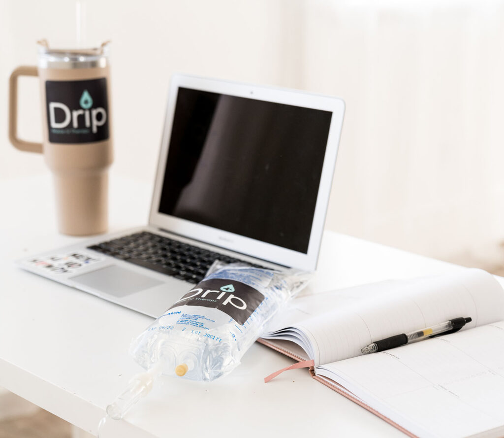 Laptop with Stanley and IV bag ready for iv therapy in lindon