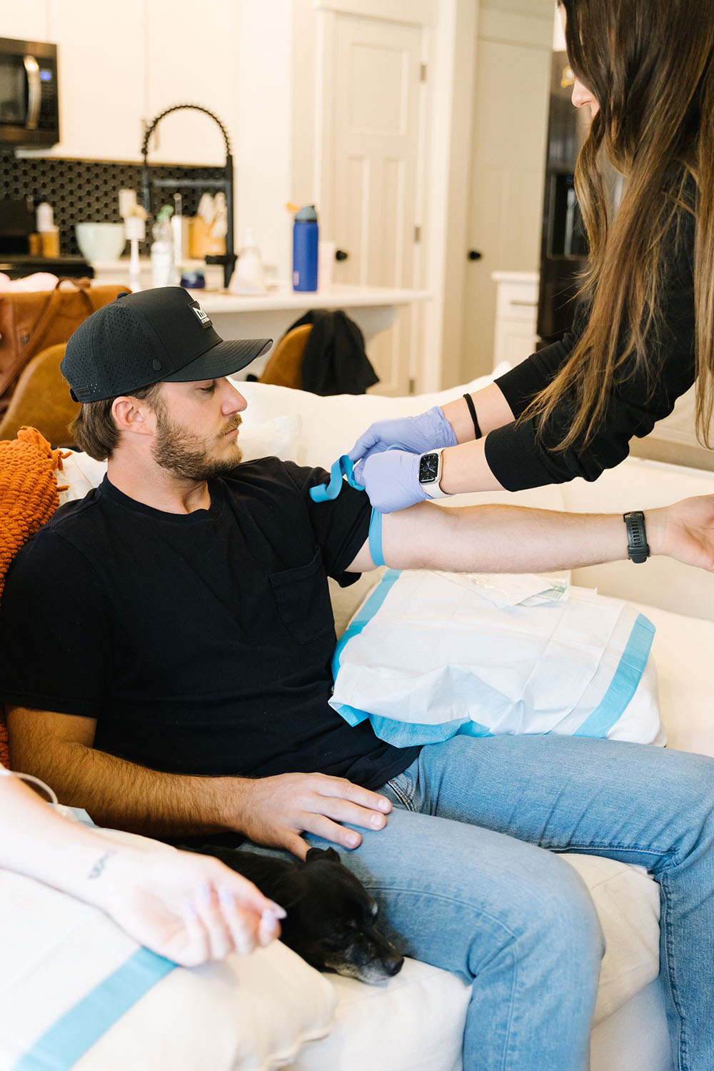 Mobile IV nurse prepping patient for a iv therapy for anxiety