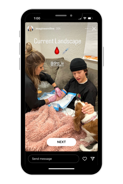 young man receiving a mobile IV on a couch. Image is framed in an iphone frame to simulate social media.