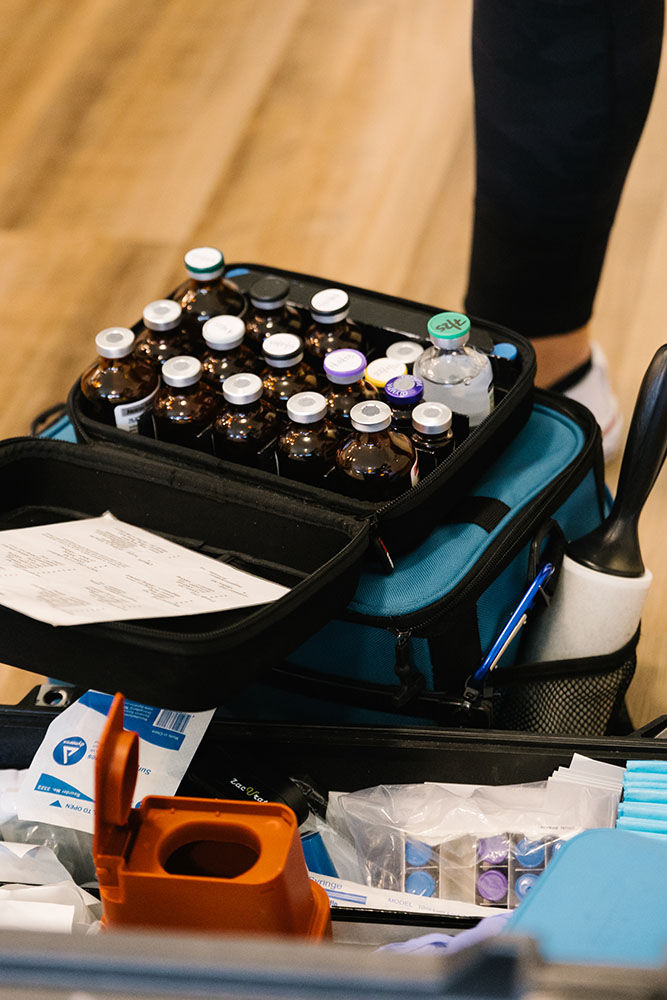 Nutrient vials in a case on the ground prepped for IV therapy in Herriman