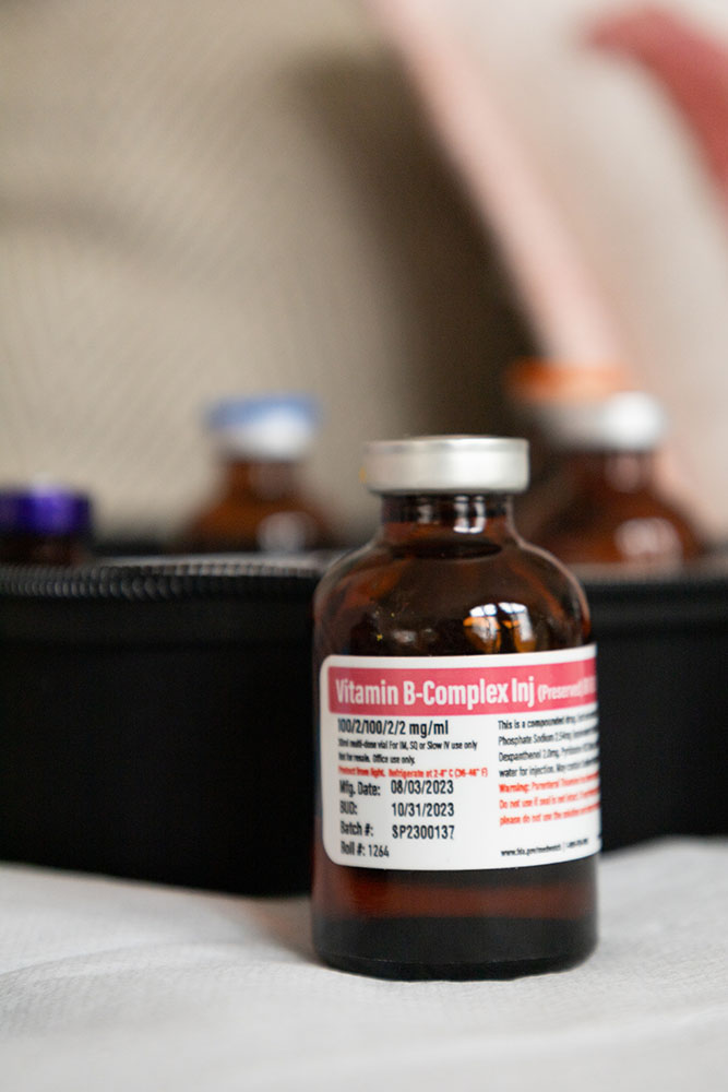 B Complex for IV therapy in Lindon, UT in a vial in front of a blurred vial case