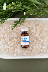 NAD, an anti-aging supplement resting on some crystals